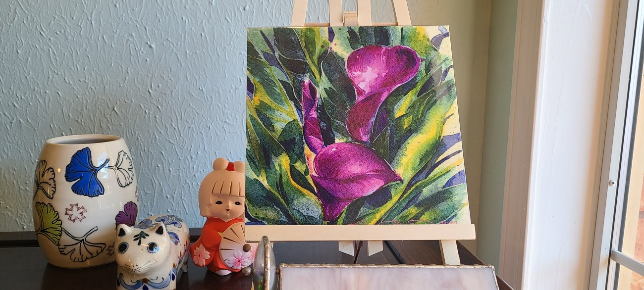 Print of a watercolor illustration of purple calla lilies.