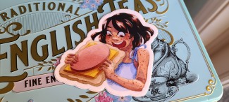 A vinyl sticker of Kara chowing down on a Lunchable. She is very excited about this little sandwich.